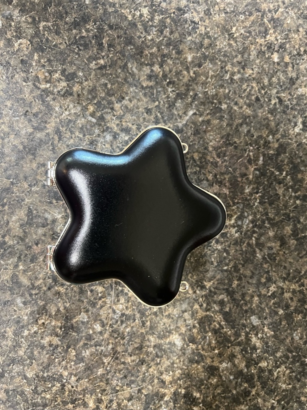 Black Star-Shaped Compact Case